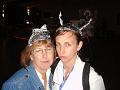 Christy and her mom with tin-foil hats (eyes closed)